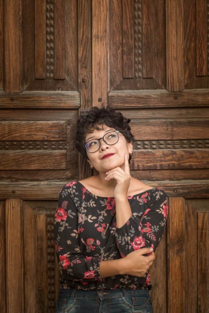 Woman thinking how Life Coaching Helps Women Over 50